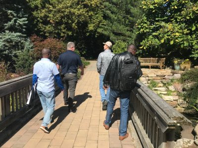 With Tom Martin (Assistant Director and Senior Instructor, Agricultural Technology Program) and Wes Gwaltney (Advanced Instructor) touring Hahn Horticulture Garden. Photo Credit: Billy Parvatam