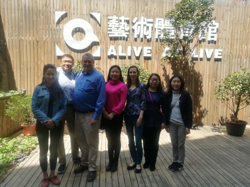 Pictured are US Fellows David Moore and Marion Batayte, Chinese Fellows Li Jie and Liu Chunhua and staff from the Kunming office of Save the Children.