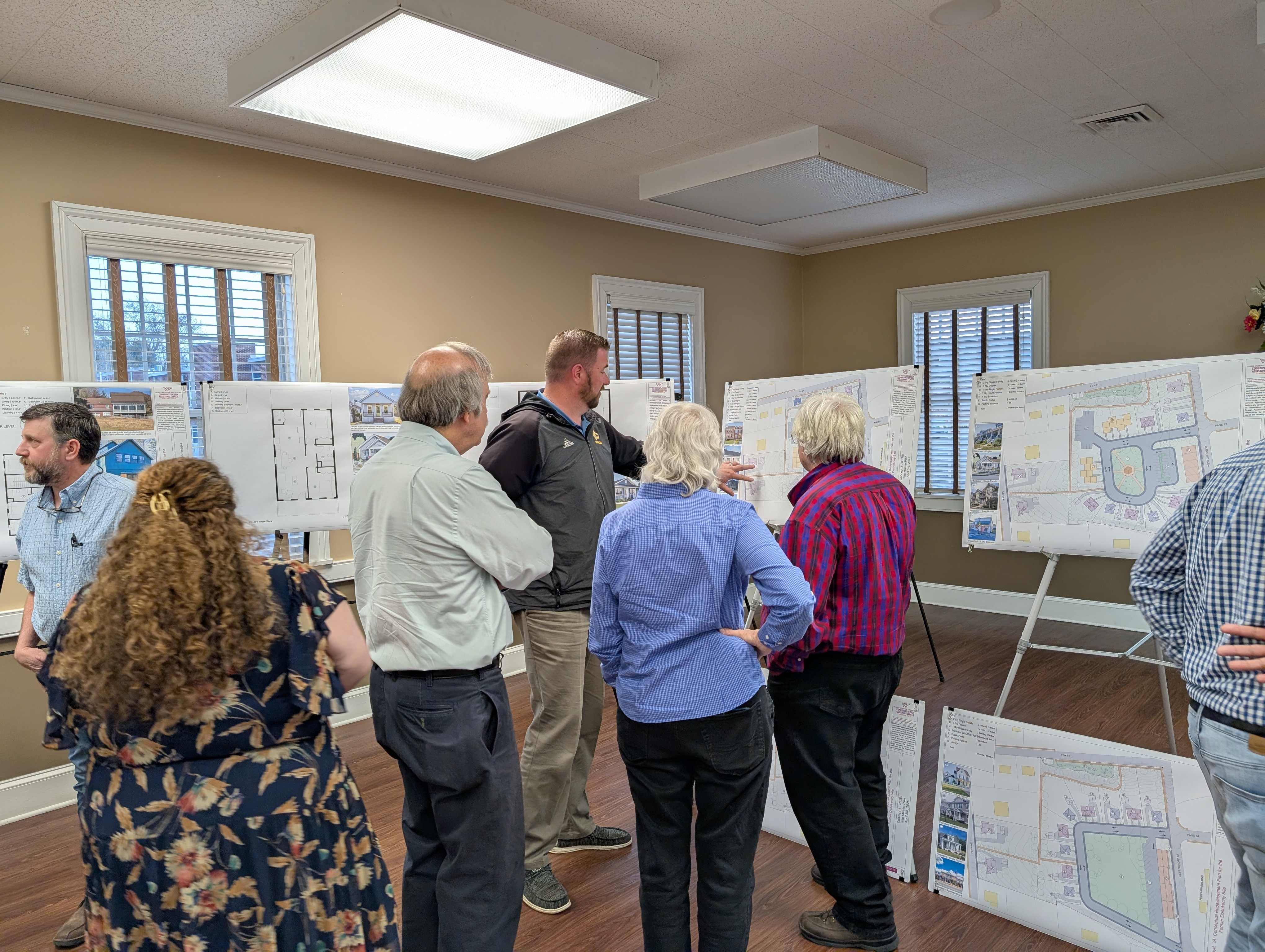 Community members review design boards in Floyd, VA